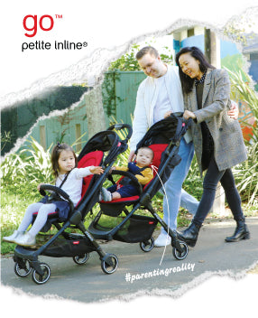 family with two toddlers pushing go™ inline™ buggy