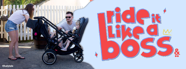Mum and Dad looking at their toddlers in a inline® double pram  - voyager™ buggy - like a boss - @katytate - philandteds.com