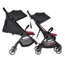 side shot of double kit for go shown in position connected to additional go buggy with rear seat in recline lie flat position