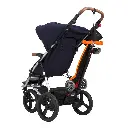 Mountain-Buggy-freerider-stroller-board-in-orange-can-be-easily-folded.webp