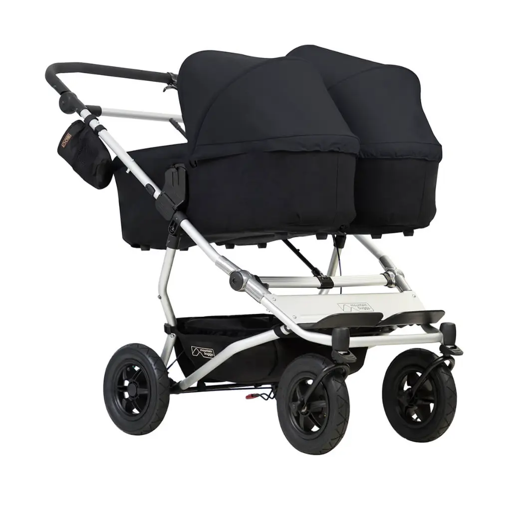 Mountain-Buggy-duet-buggy-with-double-black-carrycot-plus-in-lie-flat-mode.webp